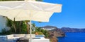 The sea view terrace with sofas and table at luxury hotel, Santorini island, Greece Royalty Free Stock Photo