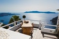 The sea view terrace with table and chairs at luxury hotel on Santorini island, Greece Royalty Free Stock Photo