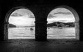 Sea view through two arches of the gallery. Cavtat, Dubrovnik, Croatia Royalty Free Stock Photo