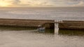 Sea wall Chania Crete at sunset