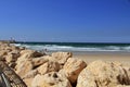 Sea Wall with Small lighthouse on the Mediterranean Sea in Herzliya Israel Royalty Free Stock Photo