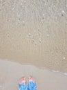 Sea water against a sand beach