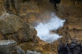 Sea water blowing out of a deep blowhole, Punakaiki