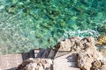 Sea water and ladder, summer natural landscape, Monaco Royalty Free Stock Photo