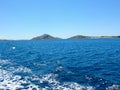 Sea water ship trail with white foamy wave. Tropical islands ferry travel. Bubble tail after cruise ship. Deep ocean view. Royalty Free Stock Photo