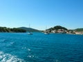 Sea water ship trail with white foamy wave. Tropical islands ferry travel. Bubble tail after cruise ship. Deep ocean view. Royalty Free Stock Photo