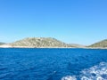 Sea water ship trail with white foamy wave. Tropical islands ferry travel. Bubble tail after cruise ship. Deep ocean view. Royalty Free Stock Photo