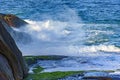 Sea water spray over the stones Royalty Free Stock Photo