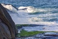 Sea water spray over the stones Royalty Free Stock Photo