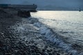 Sea water wave swash during blue hour