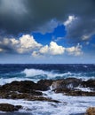 Sea wave breaking against rock Royalty Free Stock Photo