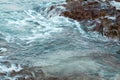 Sea wave breaking with rocky beach, Holiday and relax time concept, selective focus Royalty Free Stock Photo