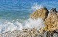 Sea wave is broken about stones. Royalty Free Stock Photo