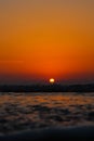 Sea wave close up, low angle view of a sunset on the ocean Royalty Free Stock Photo