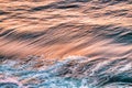 Sea wave and golden sunset reflection, Pacific Ocean, California, USA, close-up. Beautiful scenery and background Royalty Free Stock Photo