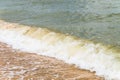Sea wave powerfully runs onto the sandy shore Royalty Free Stock Photo