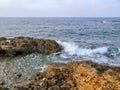 Seascape, waves hitting the coastal rocks Royalty Free Stock Photo