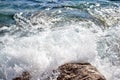 Sea wave splash on rocky beach. Ocean waves breaking on rocks. Royalty Free Stock Photo