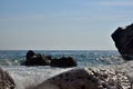 Sea wave splash on rocky beach. Ocean waves breaking on rocks. Royalty Free Stock Photo