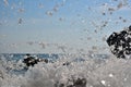 Sea wave splash on rocky beach. Ocean waves breaking on rocks. Royalty Free Stock Photo