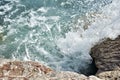 Ocean waves breaking on rocks. Sunny day nature background landscape photography Royalty Free Stock Photo