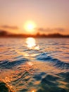 Sea wave splash, sunset, ocean water surf, sunrise, tropical island beach dawn, sun reflection, summer holidays, vacation