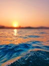 Sea wave splash, sunset, ocean water surf, sunrise, tropical island beach dawn, sun reflection, summer holidays, vacation