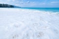 The sea wave splay white foam on the beach Royalty Free Stock Photo