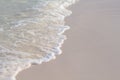 Sea wave on tropical beach photo background. Coral beach sand with sea wave. White Royalty Free Stock Photo