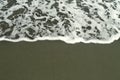 Sea wave and wet sand background Royalty Free Stock Photo