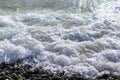 Sea waves on the beach. Selective focus. Summer nature background Royalty Free Stock Photo