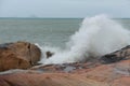 Sea waves beat against rocks and rocks