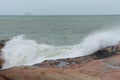 Sea waves beat against rocks and rocks