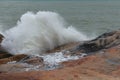 Sea waves beat against rocks and rocks