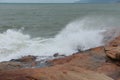 Sea waves beat against rocks and rocks