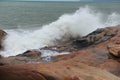 Sea waves beat against rocks and rocks