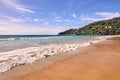 Sea waves. Blue sky. Green trees. Bright sand Royalty Free Stock Photo