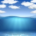 Sea waves and bottom. Realistic ocean underwater sand, water with air bubbles and blue sky with clouds. Marine landscape