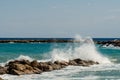 Sea waves break at stones during storm Royalty Free Stock Photo