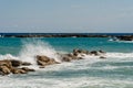 Sea waves break at stones during storm Royalty Free Stock Photo