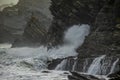 Sea waves breaking in the coast cliffs in Barrika