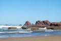 Sea waves coming to the rocks on the shore