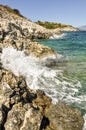 Sea waves crashing against rocky seashore. Royalty Free Stock Photo