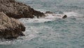 sea waves crushing over rocks with soft light Royalty Free Stock Photo