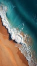 Sea waves with foam on the beach. Aerial drone point view. Huge turquoise ocean waves breaking on a lonely sandy beach on island.