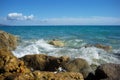 Sea waves hit stony seashore