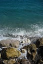 Sea waves hit stony seashore