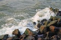 Sea waves hitting rocks on the coast of the sea Royalty Free Stock Photo
