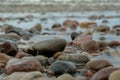 Sea waves lash line impact rock on the beach Royalty Free Stock Photo