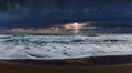 Dramatic dark stormy sky and lightning over a sea Royalty Free Stock Photo